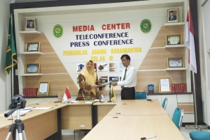 PENANDATANGANAN PERJANJIAN DAN KONTRAK KERJASAMA PENGADILAN AGAMA KARANGANYAR DENGAN PAHAM JAWA TENGAH POS KARANGANYAR UNTUK PENYEDIAAN JASA POS BANTUAN HUKUM